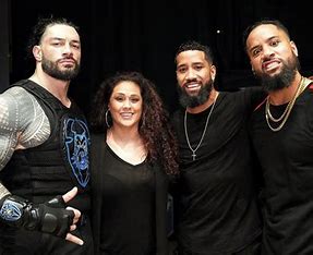 how-is-the-rock-related-to-roman-reigns