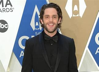 is-thomas-rhett-related- to-trace-adkins
